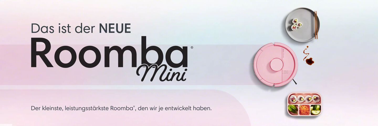 Wir pr&auml;sentieren den neuen Roomba Mini, unser bisher kleinster, aber st&auml;rkster Roomba. Roomba Mini in Pink neben einem Teller und einer Bento Box